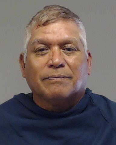 Cruz, Reyes booking photo