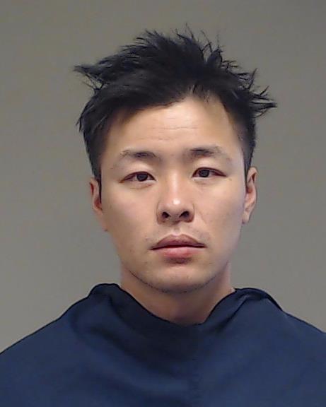Jiang, Zhao booking photo