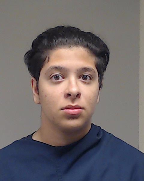 Curran, Yaseen booking photo