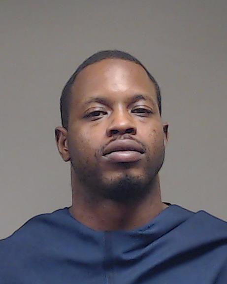 Sherman, Jim Jones booking photo