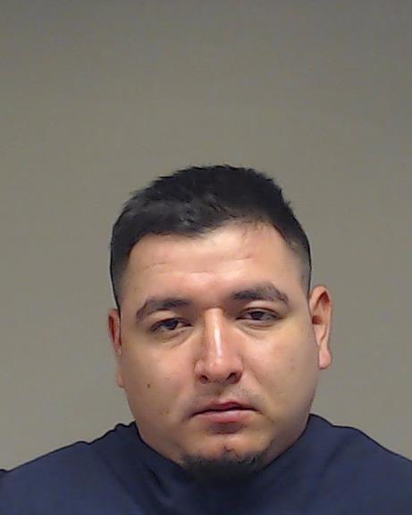 Reyes Briones, Carlos booking photo