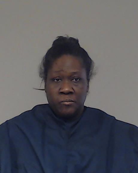 Minifield, Arnella Trinez booking photo