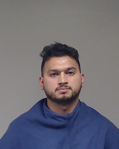 Rijal, Aryan booking photo