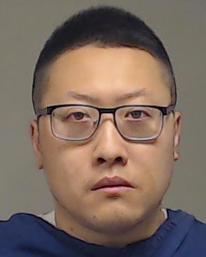 Guan, Heran booking photo
