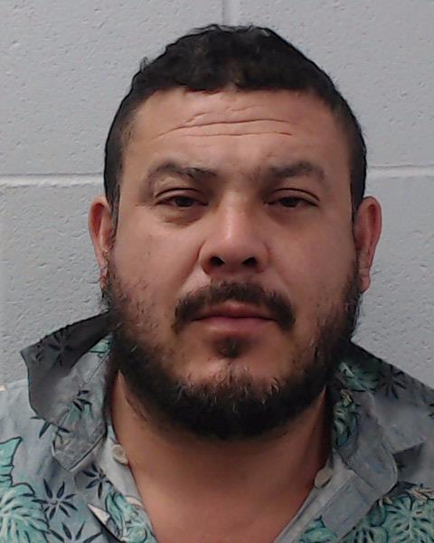 Merez-Manzano, Christian Ulisses booking photo