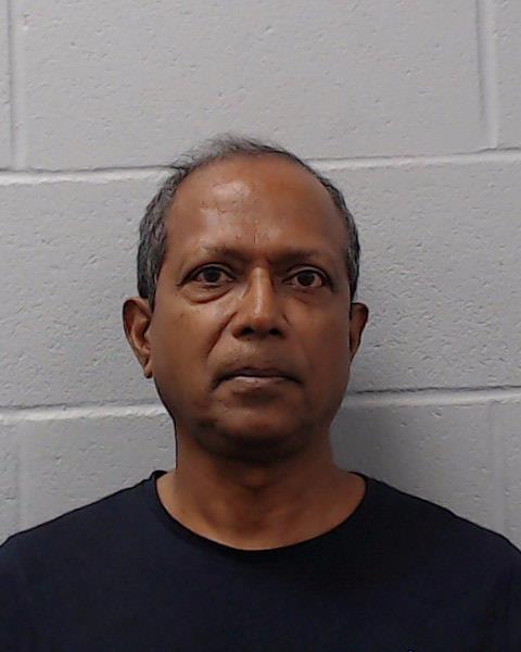 Syed, Zia Hossain booking photo