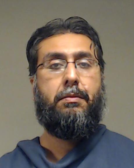 Shah, Zaid Husain booking photo