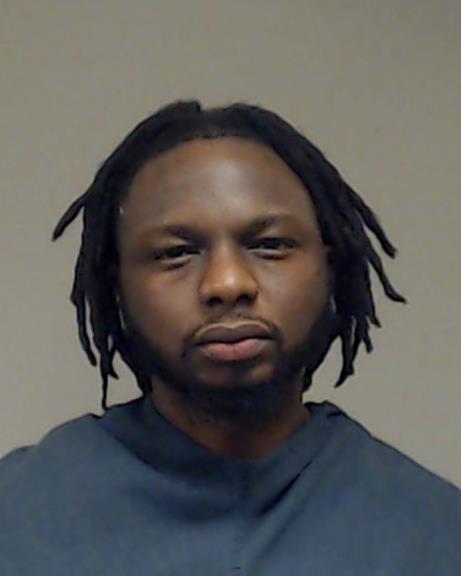 Cham, Pa Omar Ebrima booking photo