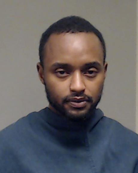 Muigai, Arnold Lawrence booking photo