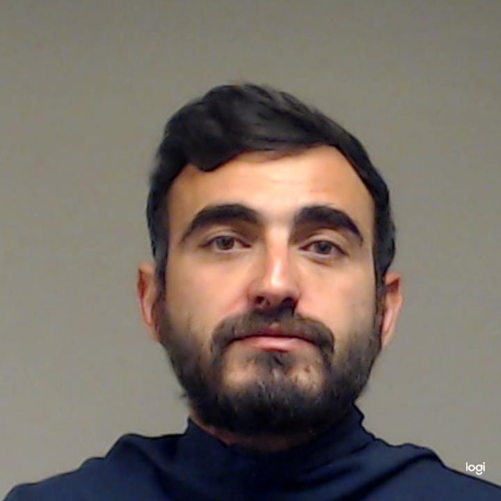 Erdogan, Soykan Ozun booking photo