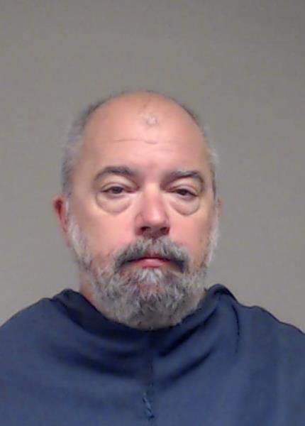 Manas, Michael Todd booking photo