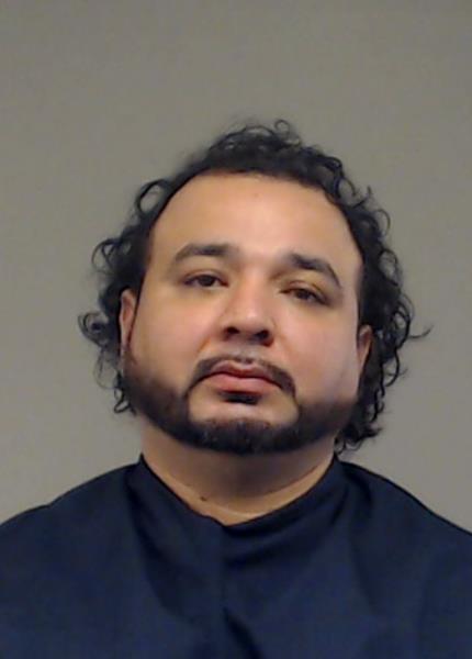 Rodriguez, Santos booking photo