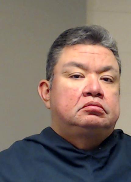 Garza, Desi booking photo