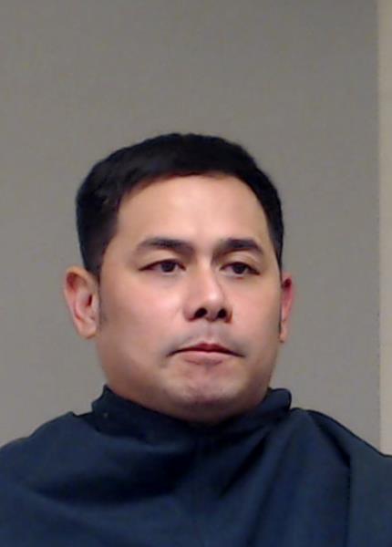 Alvarez, Joel Dela Cruz booking photo