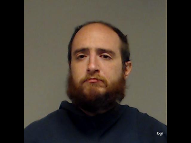Wombles, Joshua Zane booking photo