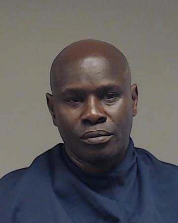 Odhiambo, Tom Mboya booking photo