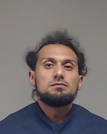 Lara, Armando booking photo