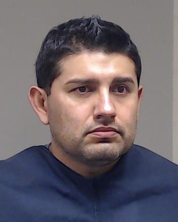 Granados Olivares, Adan booking photo