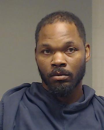 Amos, Mel booking photo