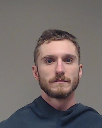 Wolf, Dennis Cortez booking photo