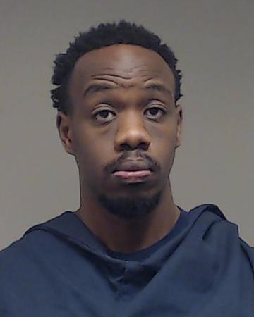 Holley, Emmauel Karimi booking photo