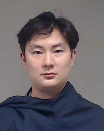 Nita, Justin Kong booking photo