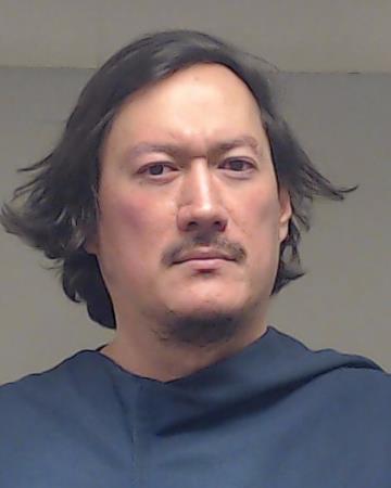 Kim, Chol booking photo