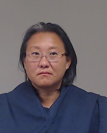 Lu, Lu booking photo