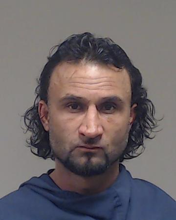 Khalil, Sayeed booking photo