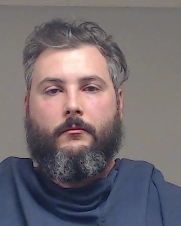 Cotton, Taylor booking photo