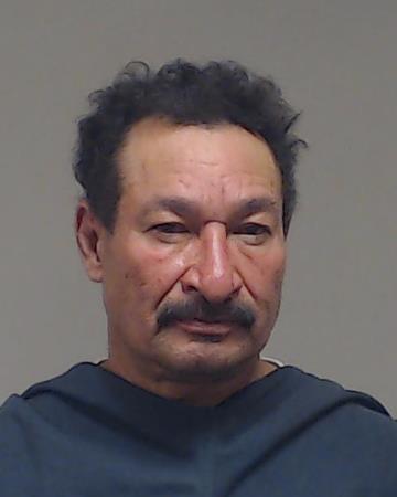 Olivia Solis, Santos Virgilio booking photo