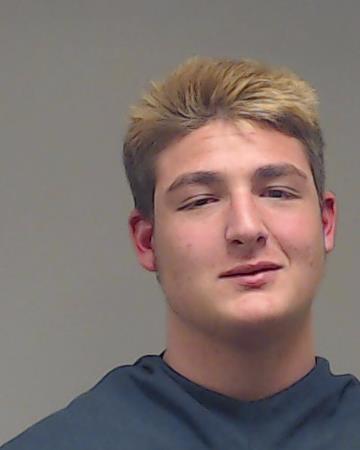 Ahmad, Christian Brock booking photo