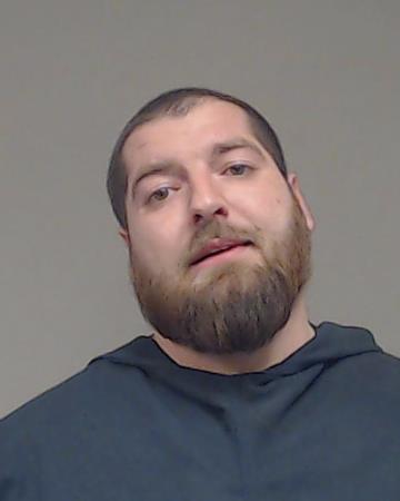 Laseak, Jacob Xavier booking photo