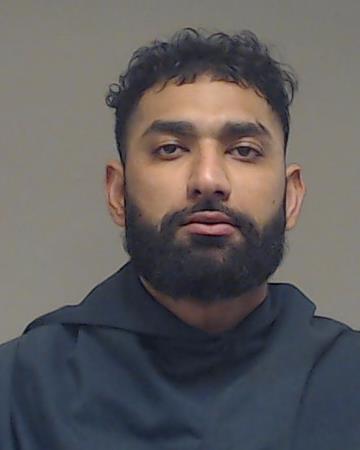 Singh, Harmanpreet booking photo