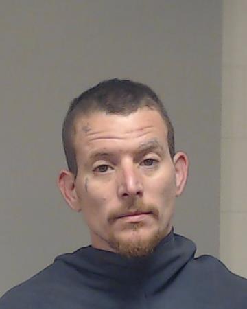 Moore, Justin booking photo