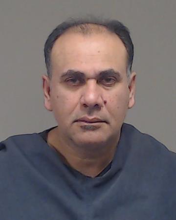 Kamali, Zamiad booking photo