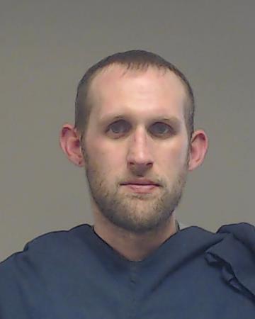 Tommie, Joshua Virgil Eric booking photo