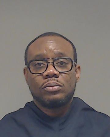 Ebeniro, John booking photo