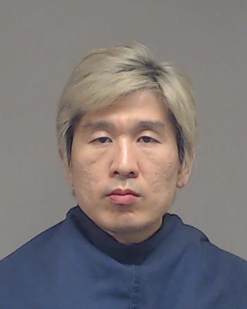 Wu, Jun booking photo