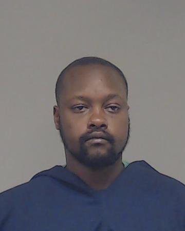 Omambia, Henry Nathan booking photo