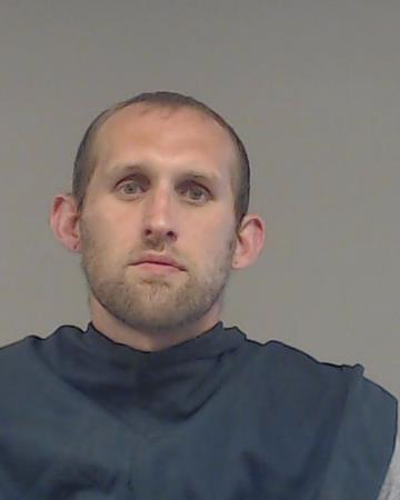 Tommie, Joshua Virgil Eric booking photo