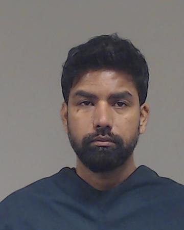 Kumar, Sachin booking photo