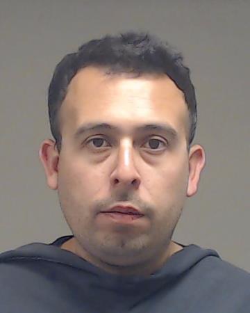 Mora, Ismael, Jr. booking photo