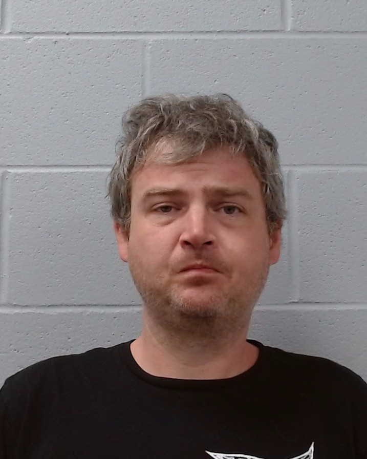 Fehler, Terry Benjamin booking photo