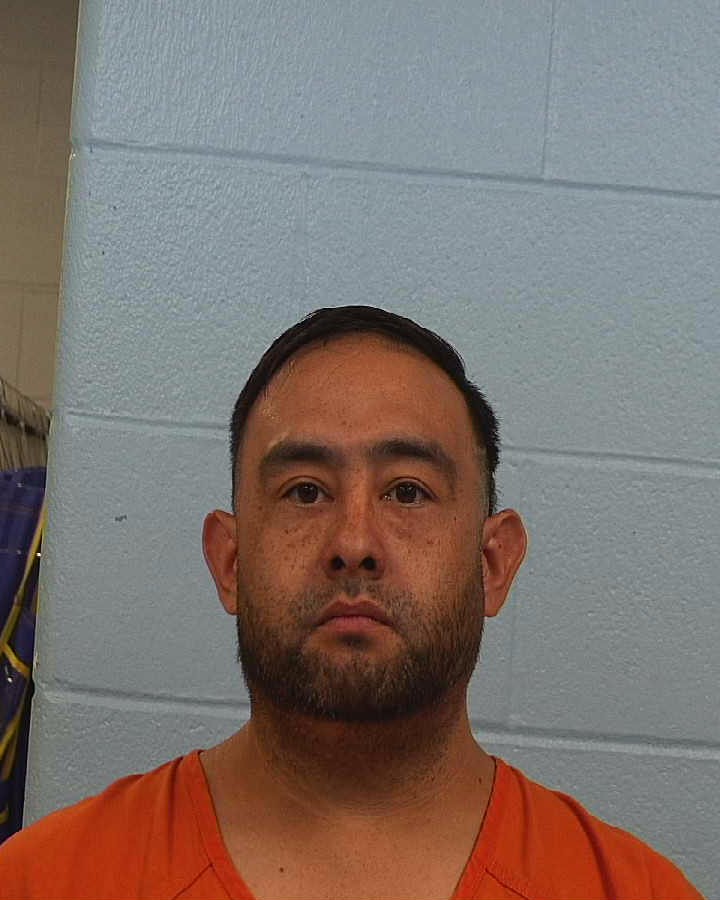 Tambunga, Eric Jason booking photo