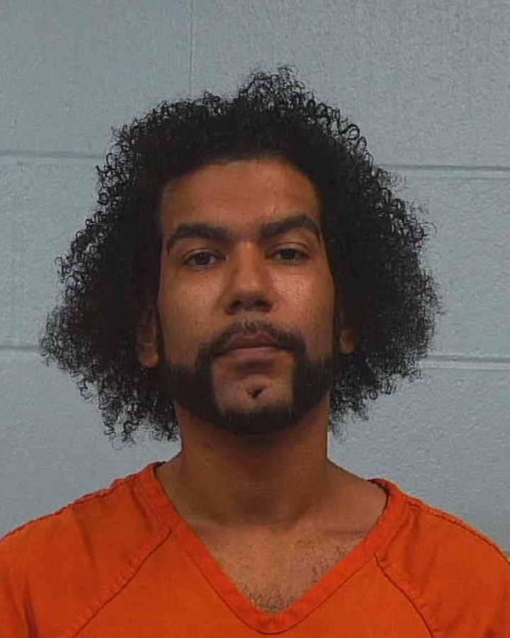 Beigi, Esmile Anthony booking photo