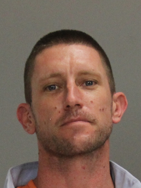 Shaleen, Justin John booking photo