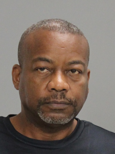 Christon, Johnny K booking photo