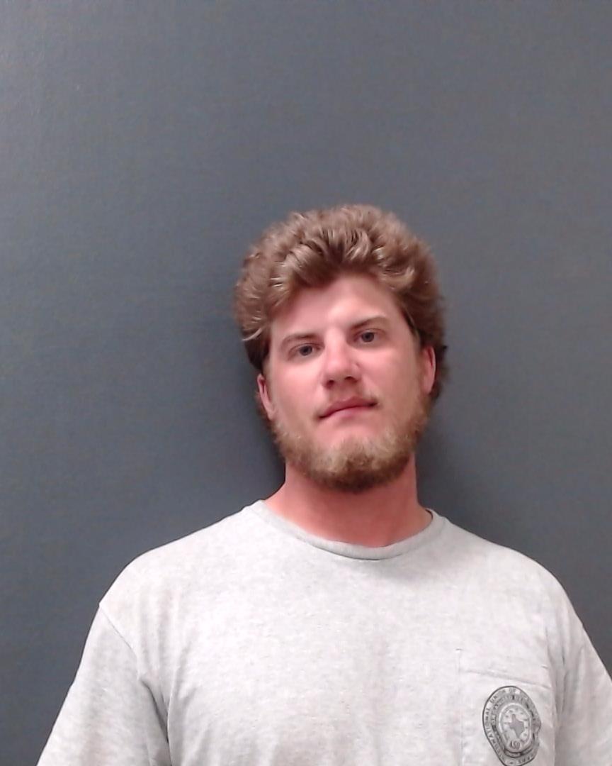 HOLCOMBE, DEVAN RAY arrested by Comal County SO/PD