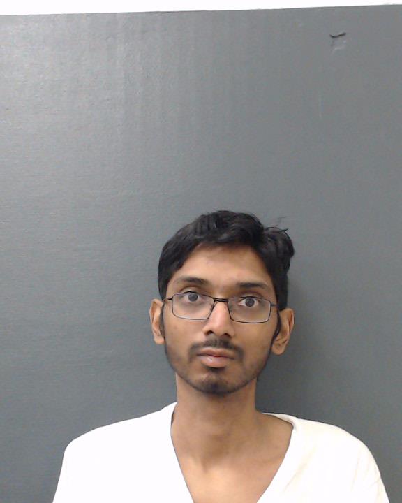 DINU, DIPESH MUKESHBHAI booking photo
